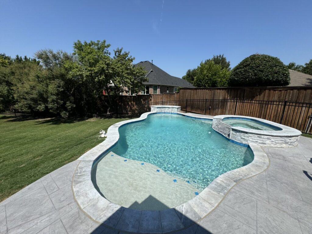 Remodeled pool by Texas Outdoor Oasis in North Texas