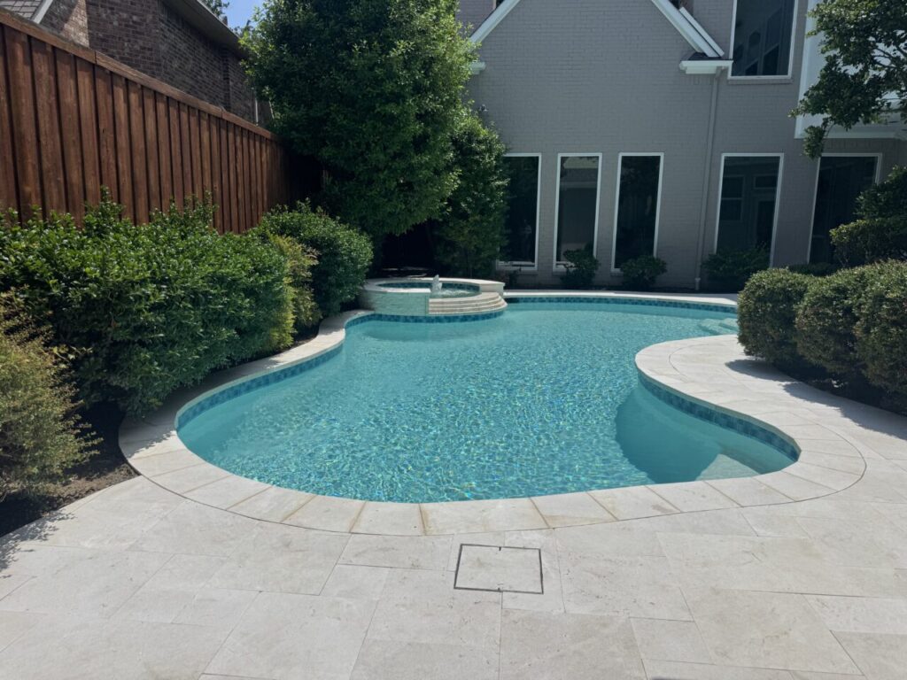 Remodeled pool by Texas Outdoor Oasis in North Texas