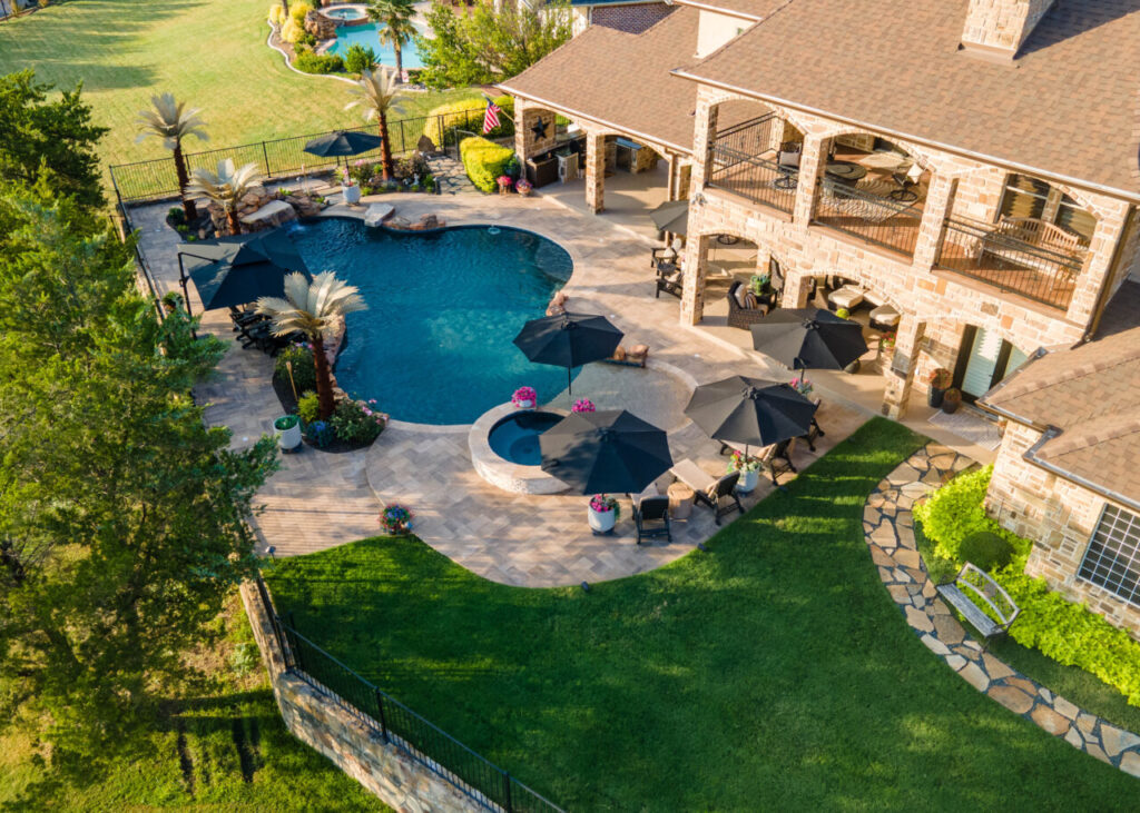 Custom Freeform Pool & Outdoor Living Space with Waterfall in DFW