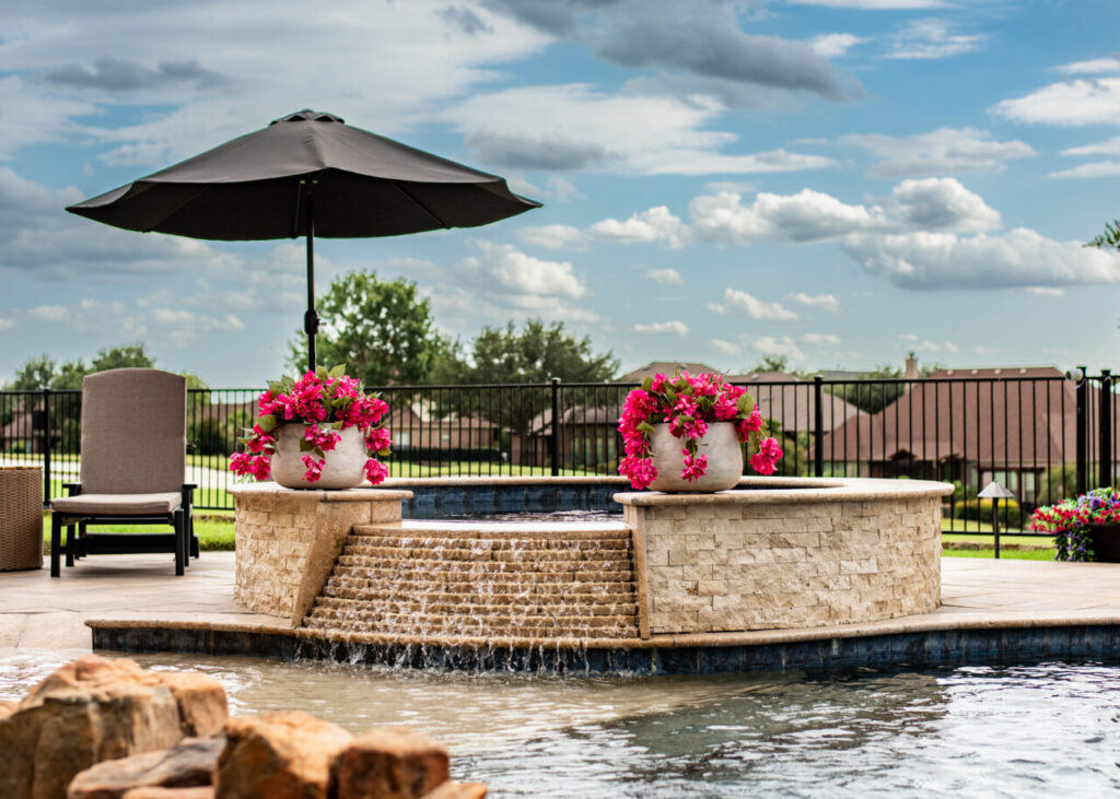 Custom Freeform Pool with a hot tub